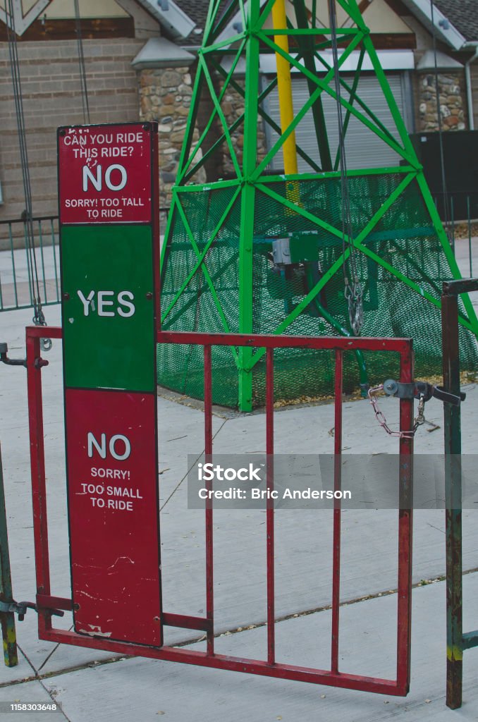 photo of amusement park barrier to entrance